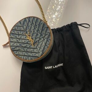 Yves Saint Laurent (YSL) denim round crossbody bag with original slip c…
